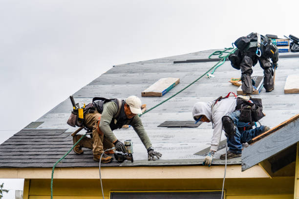 Professional Roofing technician working in Conover, OH